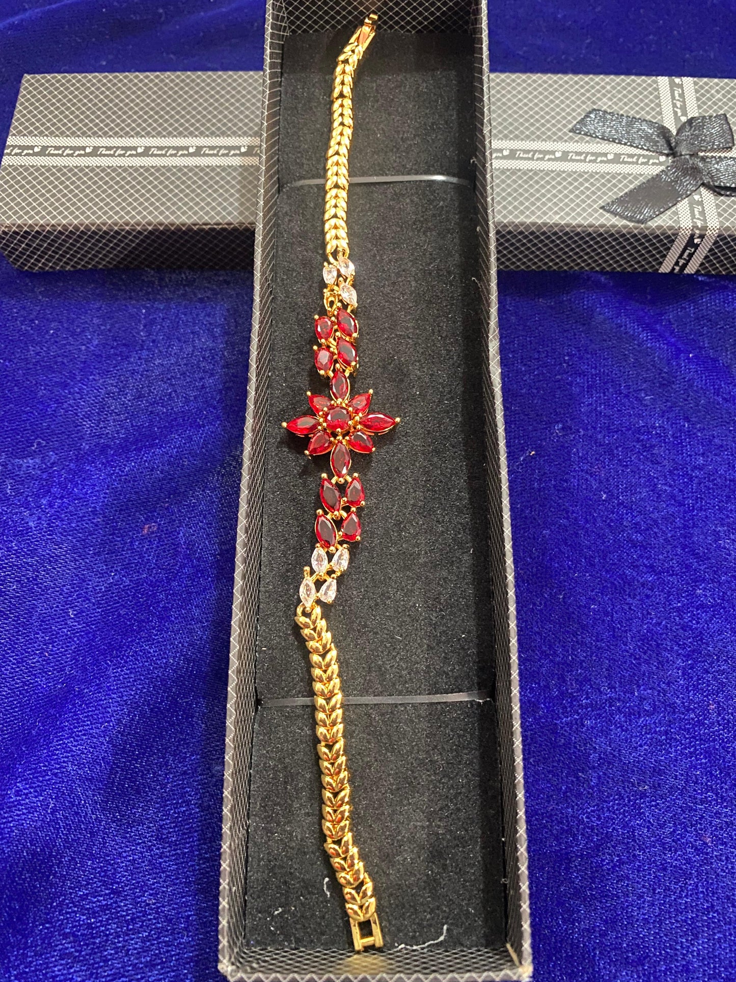 Gold and red gemstone bracelet in new flower design