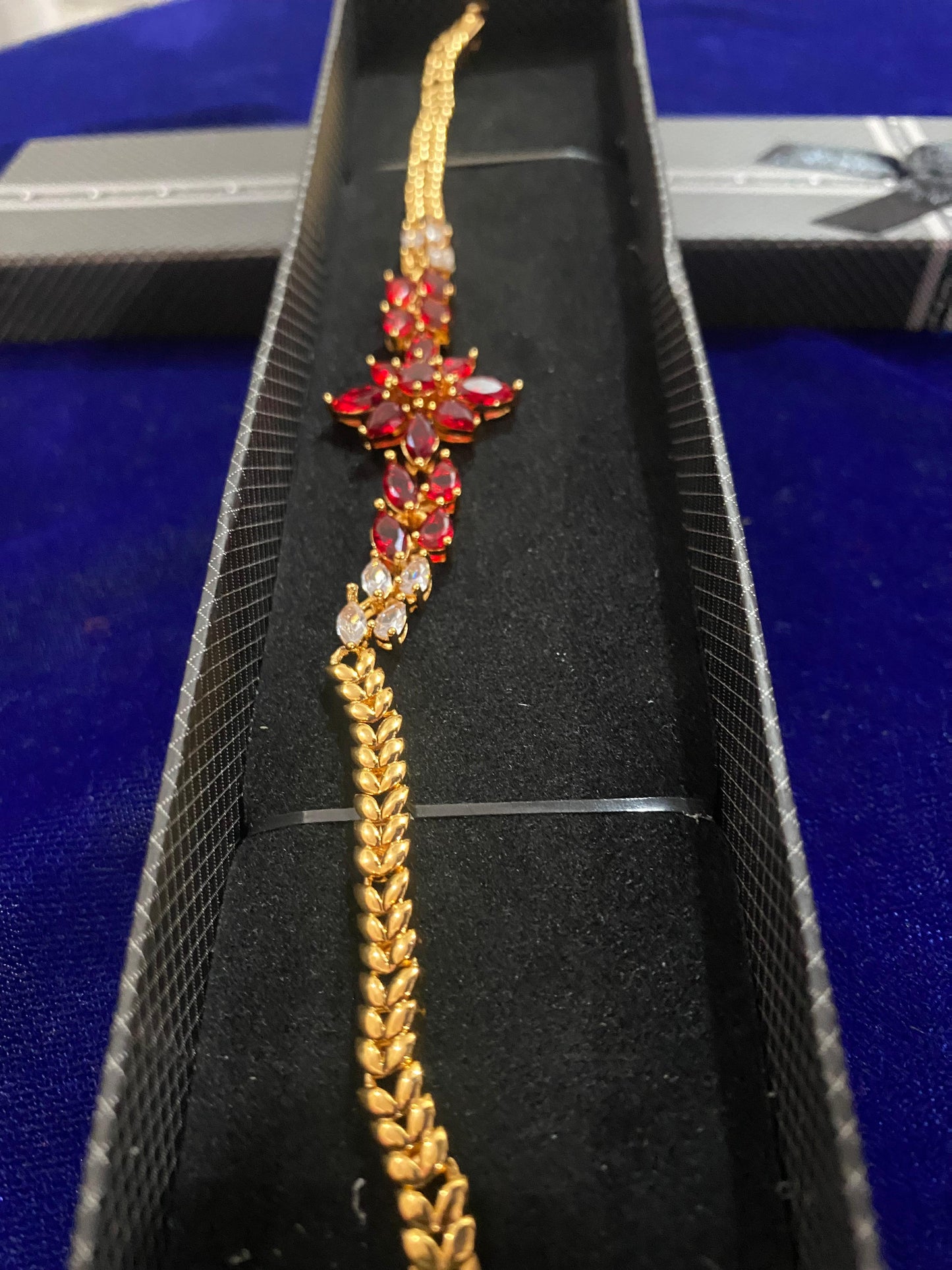 Gold and red gemstone bracelet in new flower design