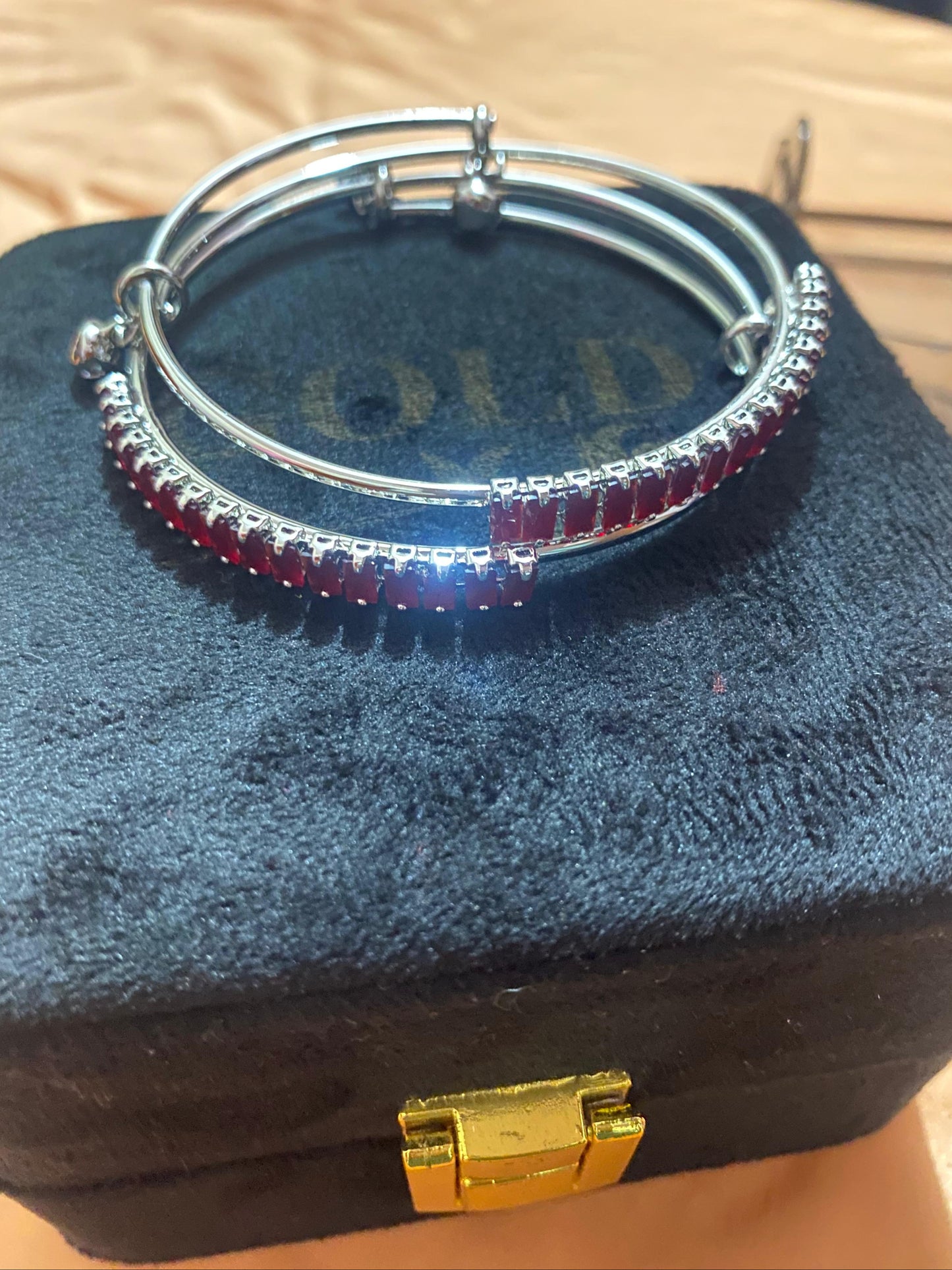 golden and silver bangles with new stylish stones