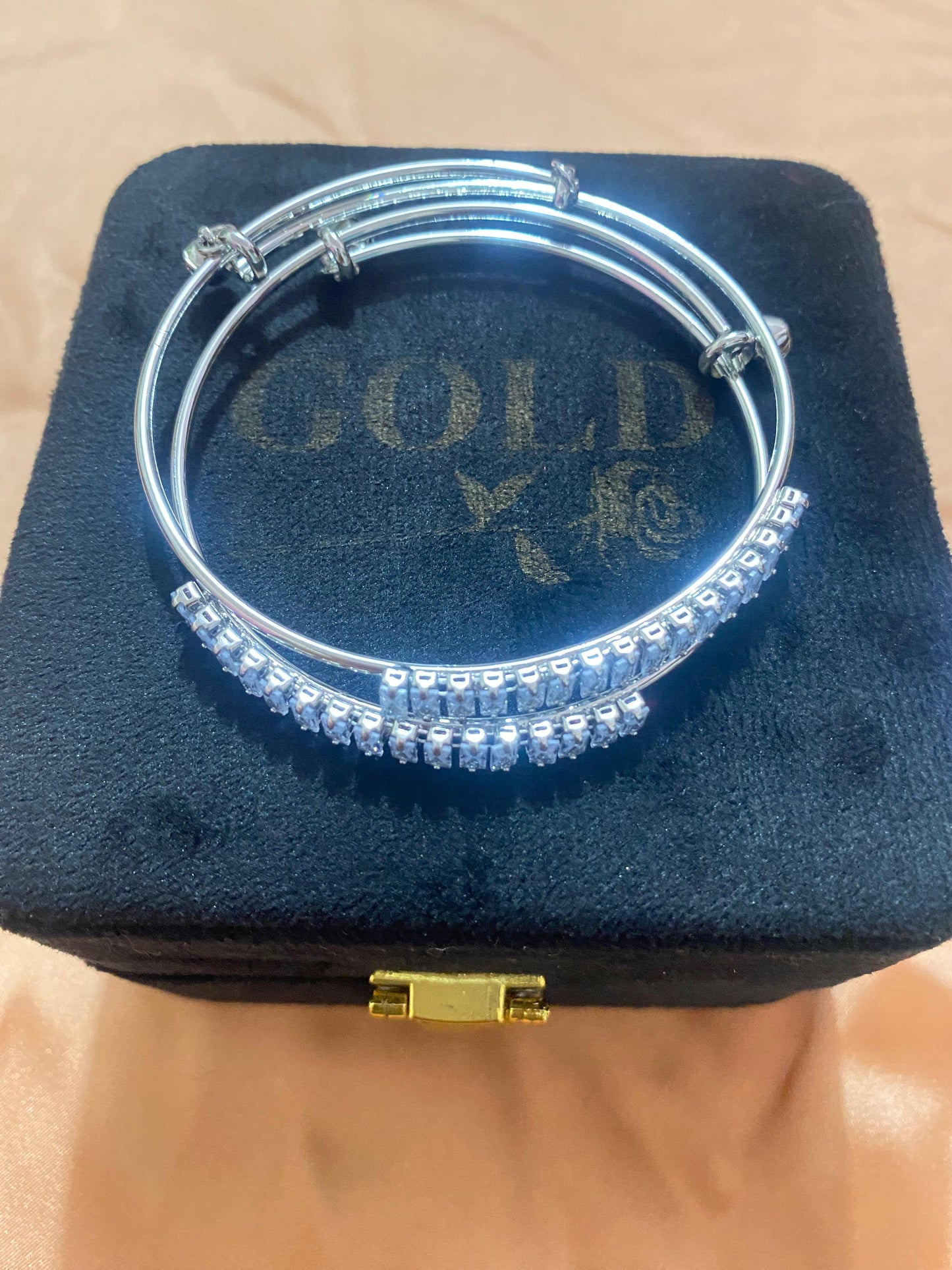golden and silver bangles with new stylish stones