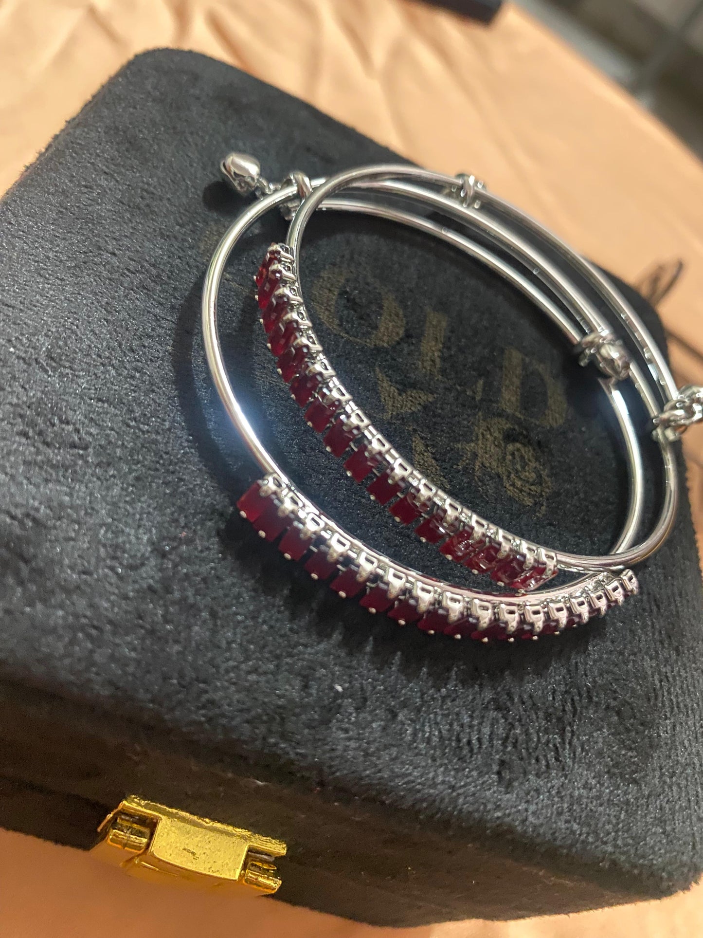 golden and silver bangles with new stylish stones
