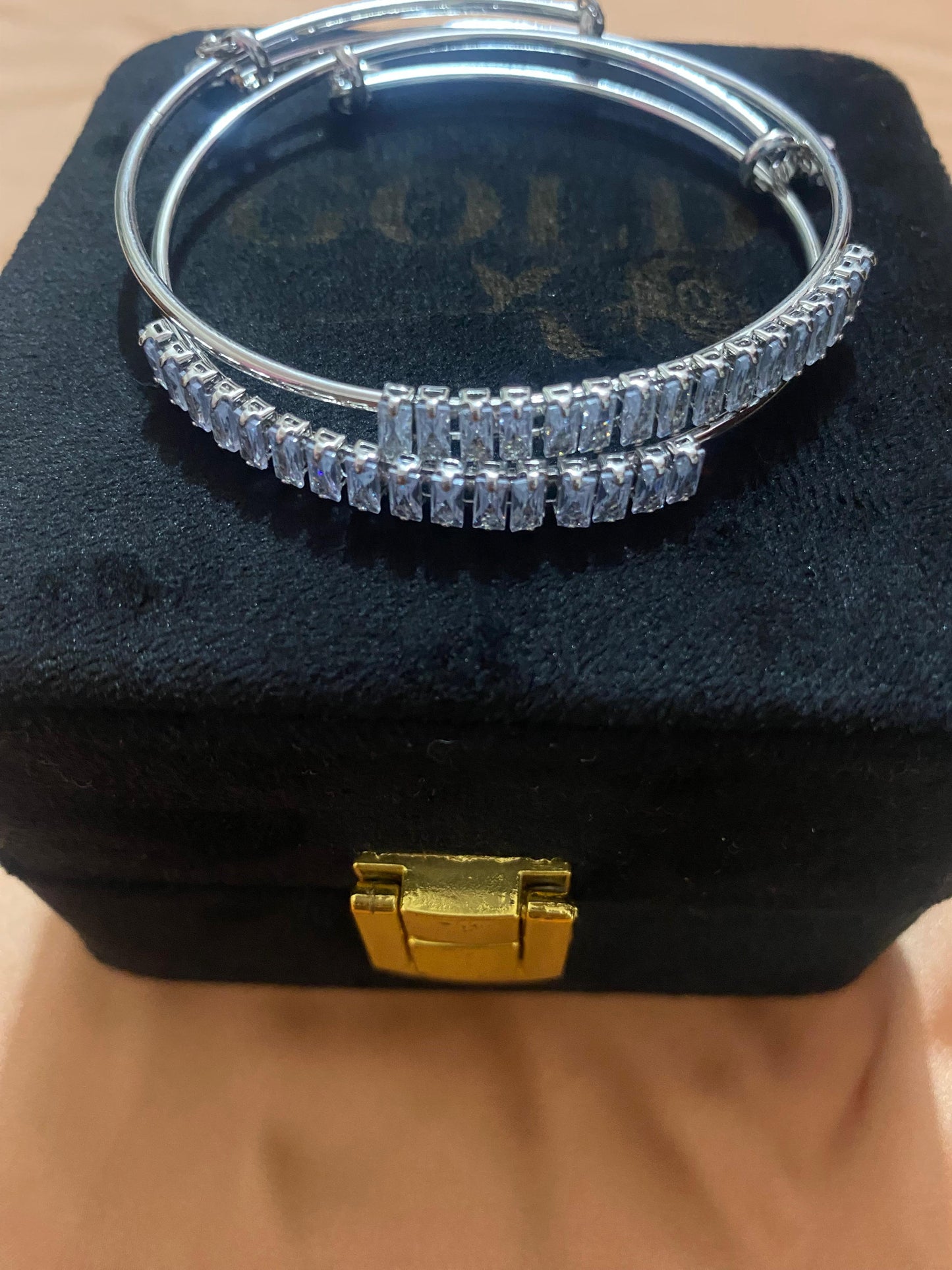 golden and silver bangles with new stylish stones