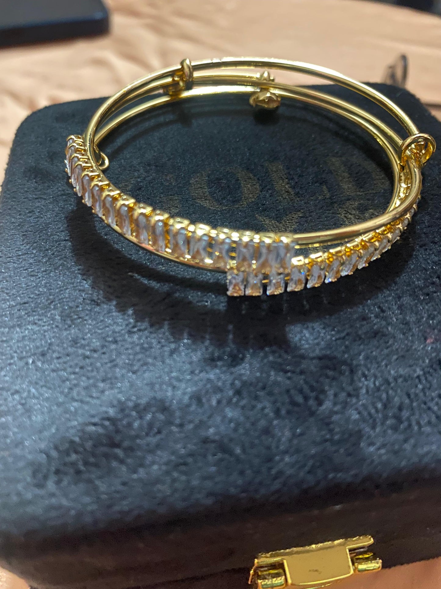 golden and silver bangles with new stylish stones